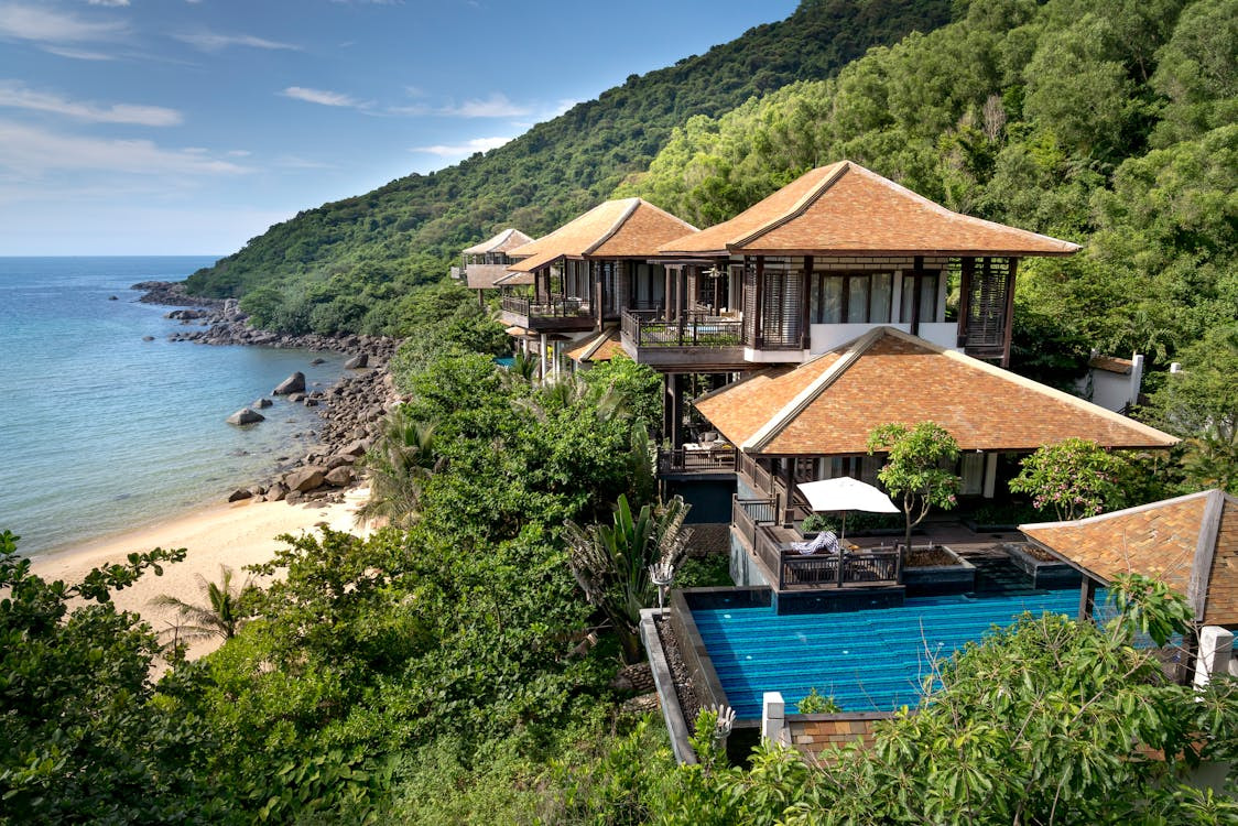 A view of a resort surrounded by greenery